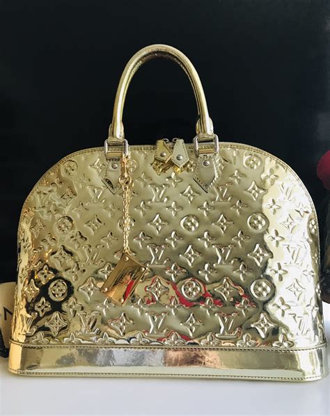 louis vuitton gold mirror bag